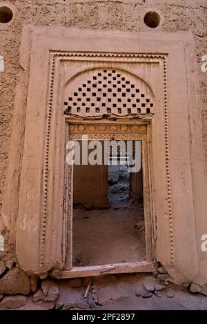 door frame in the old abandoned village of Al Munisifeh, Ibra, Oman Stock Photo