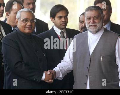 Indian and Pakistani premiers Atal Bihari Vajpayee, left, and ...