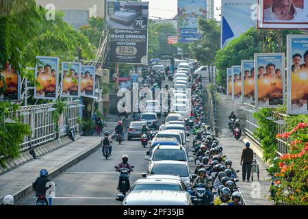 Malang, East Java, Indonesia. 16th Mar, 2023. People stuck in traffic jams during rush hour in Malang. The Indonesian National Police (Polri) noted that the number of motorized vehicles in Indonesia reached 152.51 million units as of December 31 2022. Of these, 126.99 million units or 83.27% of them in the form of a motorcycle. A total of 19.31 million motorized vehicles in Indonesia are passenger cars. (Credit Image: © Moch Farabi Wardana/Pacific Press via ZUMA Press Wire) EDITORIAL USAGE ONLY! Not for Commercial USAGE! Stock Photo