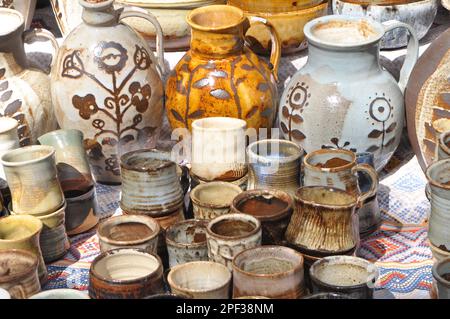 A variety of pottery made by folk craftsmen from clay. Stock Photo