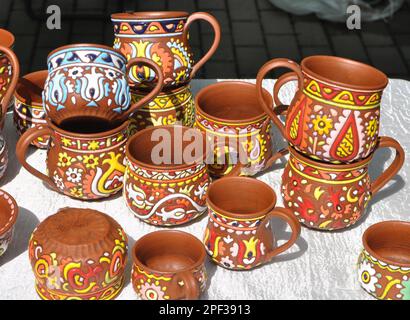 A variety of pottery made by folk craftsmen from clay. Stock Photo