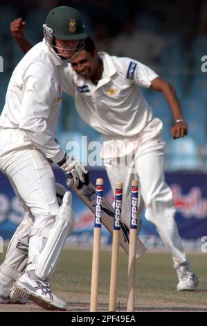 Pakistan Leg Spinner Danish Kaneria Celebrates Taking The Wicket Of ...