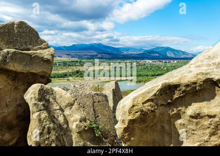 View over the Mtkvari River from the ramparts of the cave town of Uplistsikhe, known as the Fortress of the Lord, Gori, Shida Kartli district, Georgia Stock Photo