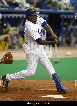 Montreal Expos' Vladimir Guerrero hits a two-run home run off St. Louis  Cardinals pitcher Larry Luebbers to extend his hitting streak to 30 games  in Montreal Wednesday, August 25, 1999. (AP PHOTO/Ryan