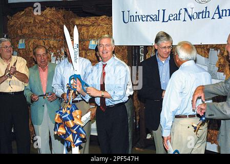 universal leaf tobacco jobs Gov. Mike Easley holds the scissors following a ribbon-cutting ceremony  Friday, Sept. 5, 2003, during the grand opening celebration for the new Universal  Leaf North America U.S. Inc. leaf tobacco processing facility