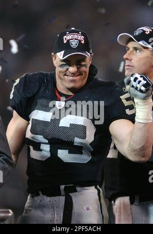 Oakland Raiders linebacker Bill Romanowski runs with the football after  recovering a fumble against the New York Jets Sunday, Jan. 12, 2003, in  Oakland, Calif. Romanowski scooped up a fumble and scurried