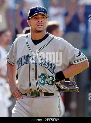 Tampa Bay Devil Rays reliever Jesus Colome walks off the field after giving  up the winning run in the 12th inning against the Cleveland Indians Sunday,  Aug. 17, 2003, in Cleveland. Indians