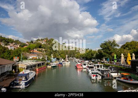 istanbul, turkey june 09 2021 : Goksu river and Anadolu Hisari neighborhood on the Anatolian side of Istanbul , marina located on the green river Stock Photo