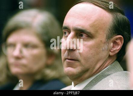 Steven Caruso 48 of Medford Mass. sits with his co counsel