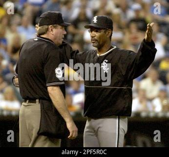 Chicago White Sox manager Ozzie Guillen, left, gets his 2005 World Series  Championship ring from chairman Jerry Reinsdorf before the game against the  Cleveland Indians on April 4, 2006, in Chicago. (UPI