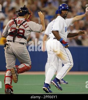 Boston Red Sox catcher Doug Mirabelli tags Detroit Tigers designated hitter  Carlos Guillen out at home on a Rondell White double in the fifth inning in  Detroit, Wednesday, May 4, 2005. Ivan