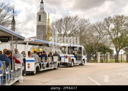 Houston, Texas, USA - February 2023: Visitors to the Houston Space Center on a land train for a tour of the site Stock Photo