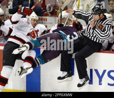 Anaheim Mighty Ducks' Steve Thomas watches the New Jersey Devils celebrate  their 3-0 victory in Game 7 Stanley Cup Finals Monday, June 9, 2003 in East  Rutherford, NJ. (AP Photo/Paul Chiasson Stock Photo - Alamy