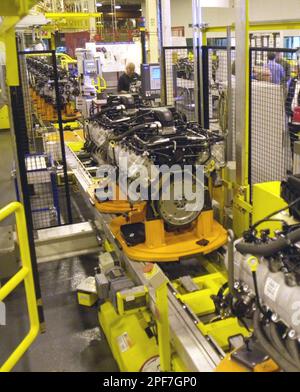 Ford V-8 engines roll off the assembly line at the Essex Engine Plant in  Windsor, Ontario, Canada Tuesday, April 29, 2003. Ford Motor Co., which  turns 100 on June 16, 2003, reached