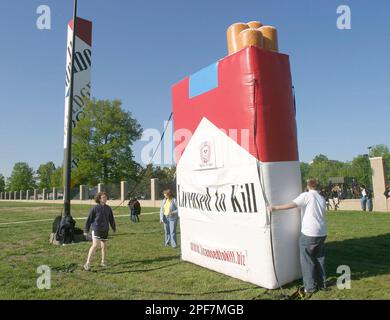 richmond virginia cigarettes Protesters move an inflatable model of a pack of cigarettes outside the  Philip Morris plant in Richmond, Va., Thursday, April 24, 2003. The  cigarette maker's parent company, Altria Group, Inc., was holding