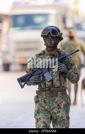 Matamoros, Tamaulipas, Mexico - September 16, 2022: Desfile 16 de Septiembre, Member of the Mexican Navy marching with their rifle Stock Photo