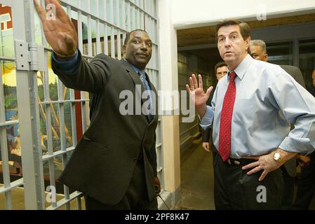 Holman Correctional Facility Warden Grantt Culliver, left, explains the ...