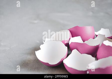 Broken Easter egg. Colored eggs. Cracked shell. Happy Easter springtime background Stock Photo