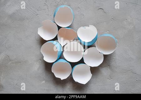 Broken Easter egg. Colored eggs. Cracked shell. Happy Easter springtime background Stock Photo