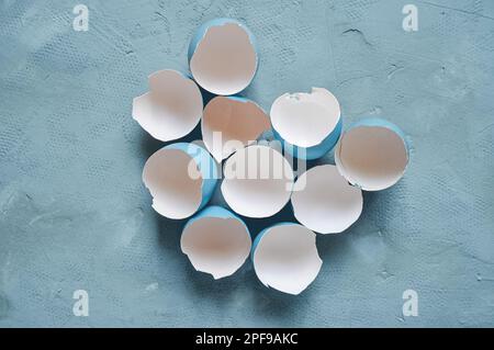 Broken Easter egg. Colored eggs. Cracked shell. Happy Easter springtime background Stock Photo