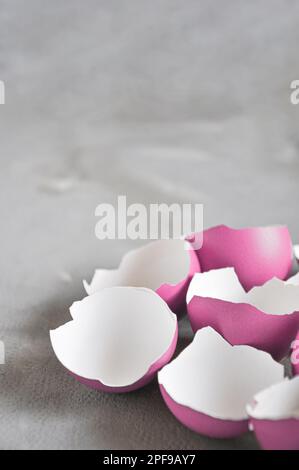 Broken Easter egg. Colored eggs. Cracked shell. Happy Easter springtime background Stock Photo