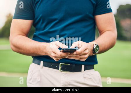 Man, hands and phone texting in communication on golf course for sports, social media or networking outdoors. Hand of sporty male chatting on Stock Photo