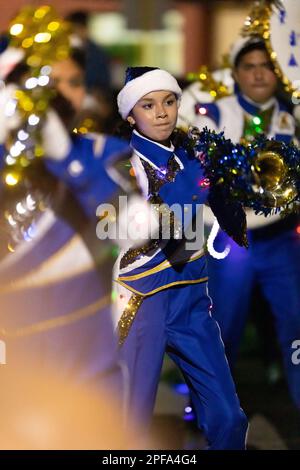 Matamoros, Tamaulipas, Mexico - Dicember 9, 2022: The Desfile de Navidad, Marching band performing at the parade Stock Photo