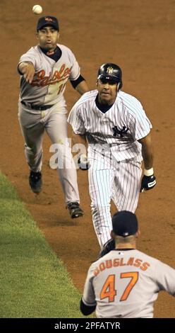 Baltimore Orioles second baseman Jerry Hairston watches as New