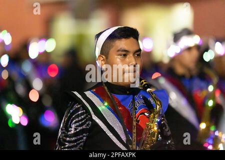 Matamoros, Tamaulipas, Mexico - Dicember 9, 2022: The Desfile de Navidad, Marching band performing at the parade Stock Photo