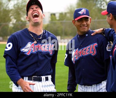 Anaheim Angels pitchers Ismael Valdez, left, and Rendy Espina share a joke  during spring training workouts Sunday, Feb. 25, 2001, in Tempe, Ariz. (AP  Photo/Mike Fiala Stock Photo - Alamy