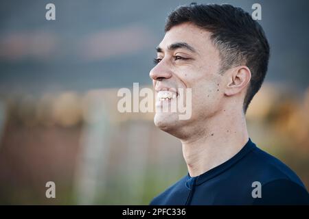 Profile, face and happy with man in outdoor for confidence, satisfaction and natural. Smile, happiness and joy with side view of young male and enjoy Stock Photo