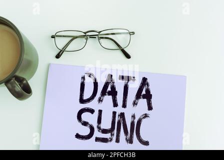 Handwriting text Data Sync. Concept meaning data that is continuously generated by different sources Stock Photo