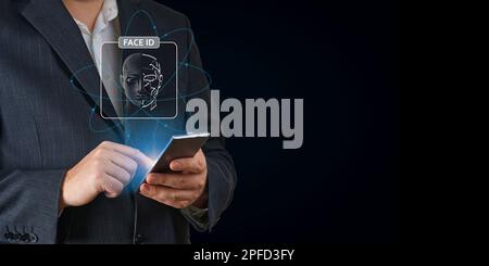 Man using mobile phone with face id scan and modern technology. Login using Face id and AI Stock Photo