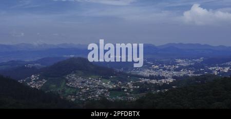 scenic view of ooty cityscape and panoramic view of nilgiri hills from doddabetta peak, highest peak of nilgiri mountains in tamilnadu, south india Stock Photo