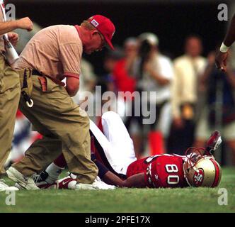 Tampa Bay Buccaneers' wide reciever Thomas Jones (22) tries in vain to  escape a tackle from Houston Texans' centerback Demarcus Faggins (38)  during the Bucs' 16-3 win against the Texans at Raymond