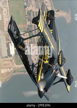 Biplane upside down practicing for an air display. Aircraft is G-J111 ...