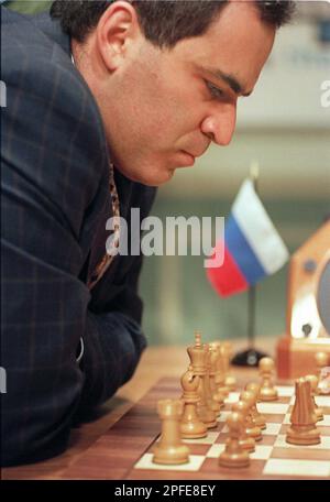 World chess champion Garry Kasparov walks around the playing room as he  waits for IBM's Deep Blue chess playing computer to make its next move  during the third game of their six