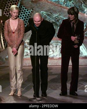 Members of The Smashing Pumpkins, Billy Corgan, center, D'Arcy