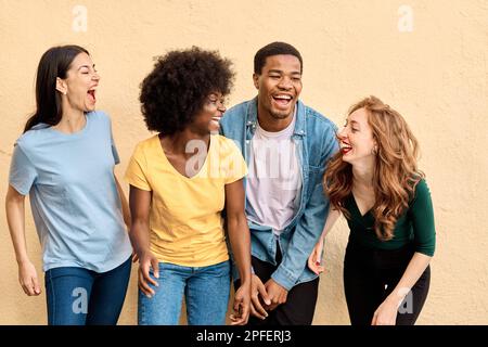 Studio portrait of happy multiethnic people laughing Stock Photo