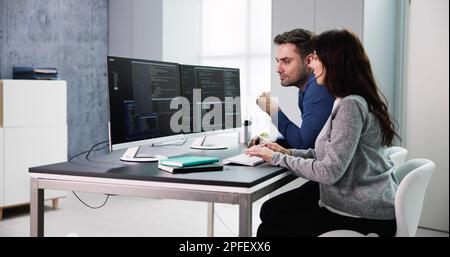 Agile Pair Programming And Extreme Coding. Business Software Stock Photo