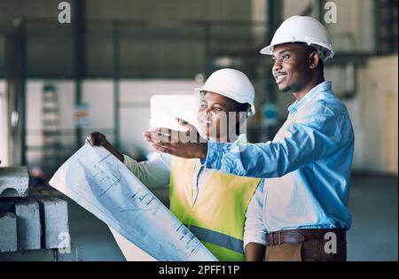If you bring it, they will build it. two builders having a meeting at a construction site. Stock Photo