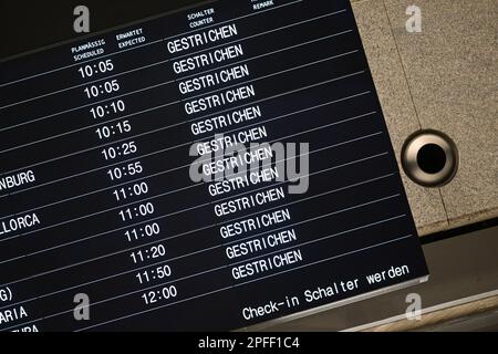 Stuttgart, Germany. 17th Mar, 2023. A display board at Stuttgart Airport shows cancelled flights. Flights are canceled due to a Verdi strike. Credit: Bernd Weißbrod/dpa/Alamy Live News Stock Photo