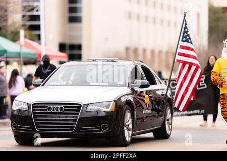 Laredo, Texas, USA - February 19, 2022: The Anheuser-Busch Washington’s Birthday Parade, Audi car and the Tiger mascot part of the No Limit Car Club Stock Photo