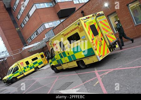 File photo dated 16/03/2023 of ambulances outside St George's hospital in London. A £1.2 billion deal between two data management and software companies could push up costs for the NHS by reducing competition, a regulator has found. The Competition and Markets Authority (CMA) gave UnitedHealth and Emis five days to come up with a plan to mitigate some of its concerns - or risk the watchdog blocking the deal. UnitedHealth announced its plan to take over Emis last June. The deal would combine its subsidiary Optum with Emis in the UK. Issue date: Friday March 17, 2023. Stock Photo