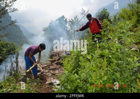 Rudarprayag, Uttarakhand, India, June 16 2014, Police team searching dead bodies of Kedarnath disaster victims. Kedarnath was devastated on June 2013 Stock Photo