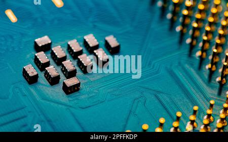 Macro Close up of microchips and pins on Main CPU PC processor circuit board. Stock Photo