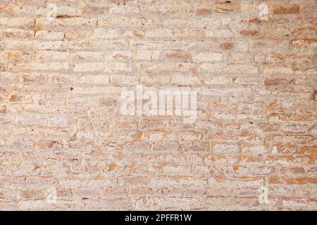 Old vintage dirty brick wall with white stains background. Full frame Stock Photo