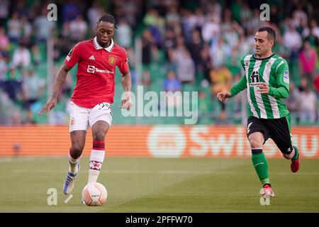 Seville, Spain. 16th Mar, 2023. Aaron Wan-Bissaka (29) of Manchester United and Juanmi (7) of Real Betis seen during the UEFA Europa League match between Real Betis and Manchester United at Estadio Benito Villaarin in Seville. (Photo Credit: Gonzales Photo/Alamy Live News Stock Photo