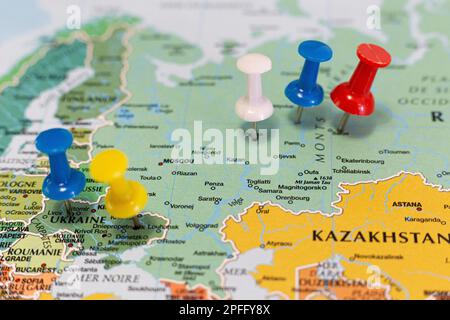 Location Ukraine and Russia. Multi-coloured pins on a map. Stock Photo