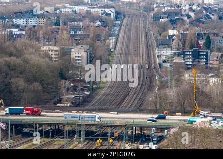 Duisburg, Germany. 17th Mar, 2023. The 8-lane rail line at the Kaiserberg interchange (aerial photo taken with a drone). The railroad will completely close the heavily used line between Essen and Duisburg for two weeks from 9 p.m. on March 31 to April 14 during the Easter vacations. At a total cost of nine million euros, tracks in Duisburg, Oberhausen and Essen would be renewed over a distance of seven kilometers, points replaced and the power supply for the trains modernized. Credit: Christoph Reichwein/dpa/Alamy Live News Stock Photo